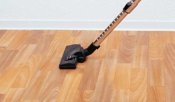 Vacuum cleaner on floor at home